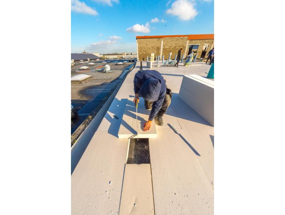 Recticel Insulation Powerdeck F panel being cut installation image