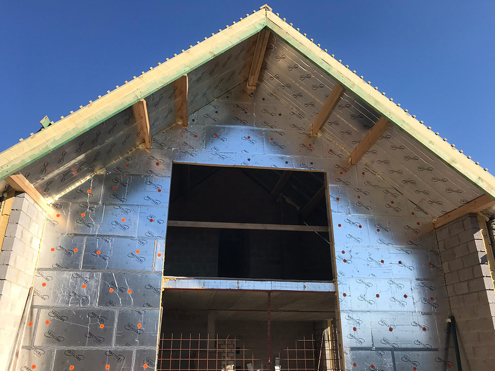 Dubbele vakantiewoning geïsoleerd met Recticel Insulation L-Ments en Eurowall isolatie