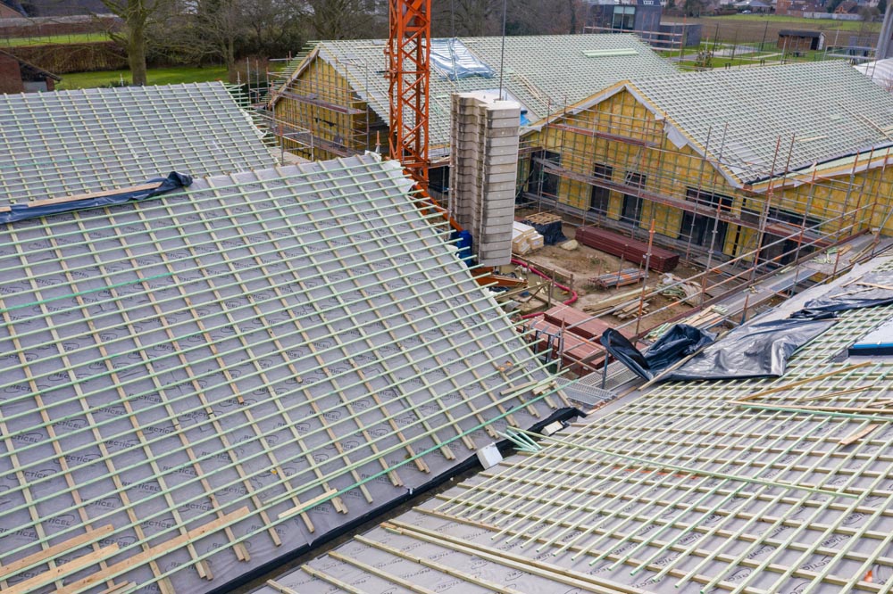 Nieuwbouw project vzw Ubuntu geïsoleerd met Powerroof Max hellend dak isolatie