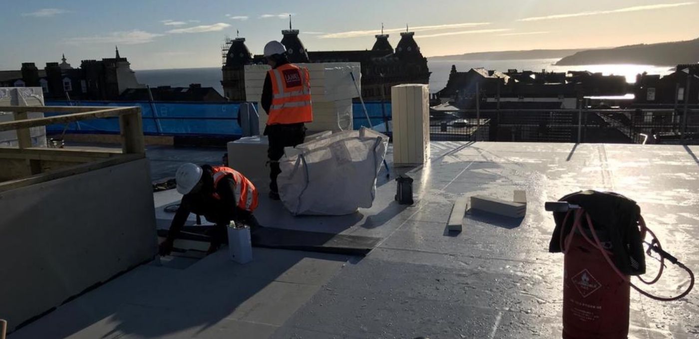 Recticel Insulation's Powerdeck F in Premier Inn Scarborough flat roof sunset image