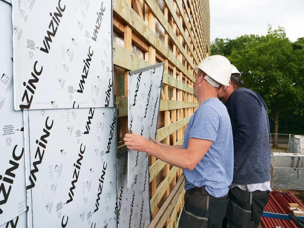 Campus West bedrijventerrein/ kantorenpark geïsoleerd met Powerwall buitengevelisolatie - plaatsing vmzinc