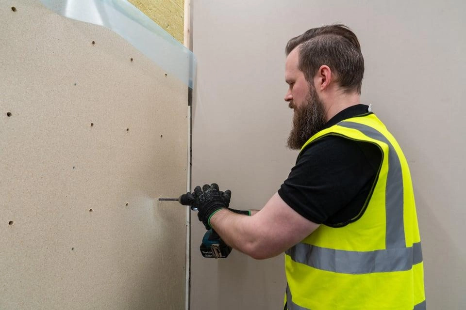 drilling in PIR insulation installation